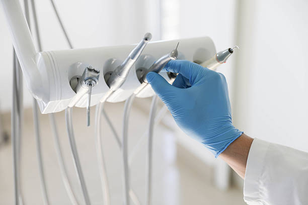Professional Tooth Extraction technician working in San Antonio, FL